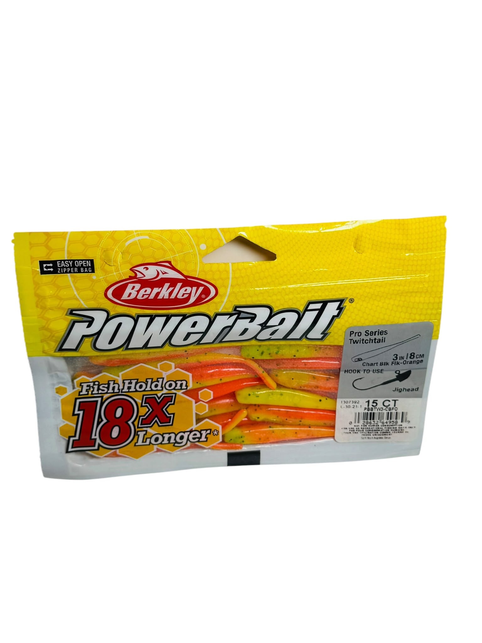 Package of Berkley PowerBait Pro Series Twitchtail fishing lures in yellow, orange, and chartreuse soft plastic with product label